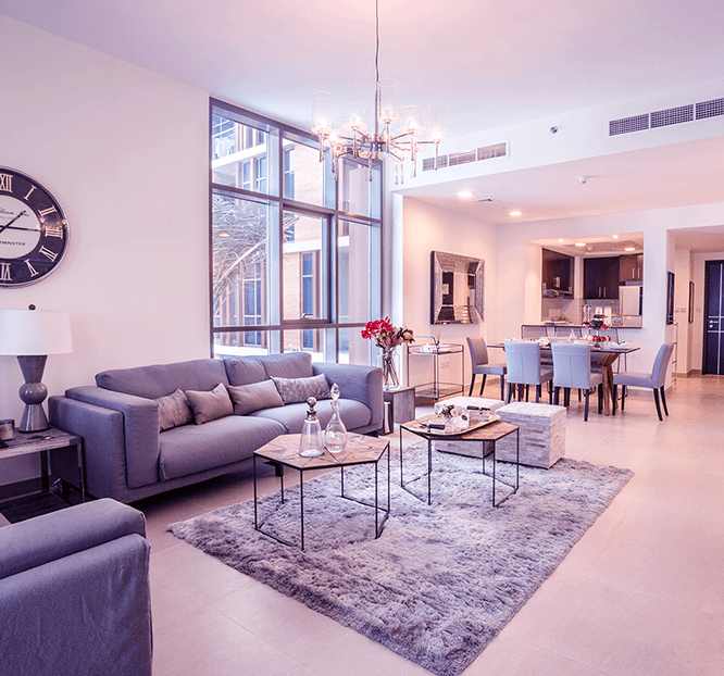 living room with two grey couchs 